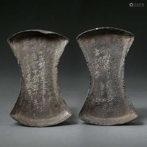 A PAIR OF ANCIENT CHINESE SILVER INGOTS