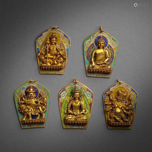 A SET OF TIBETAN GILT BRONZE BUDDHA PLATES