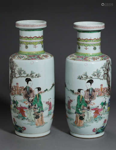QING DYNASTY, A PAIR OF KANGXI FAMILLE ROSE BOTTLE, DEPICTS MOTHERS AND SONS PLAYING IN A YARD