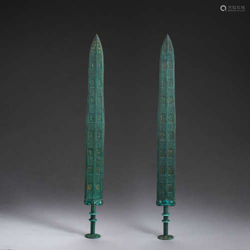 A PAIR OF ANCIENT CHINESE BRONZE SWORDS