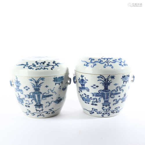 A pair of blue and white vessels decorated with Eight Immortals