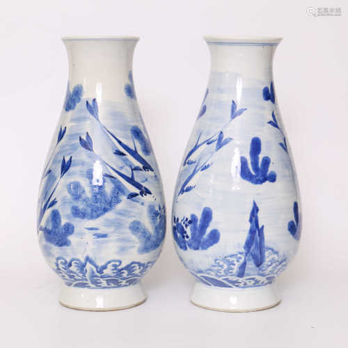 A pair of blue and white sea fish pattern bottles