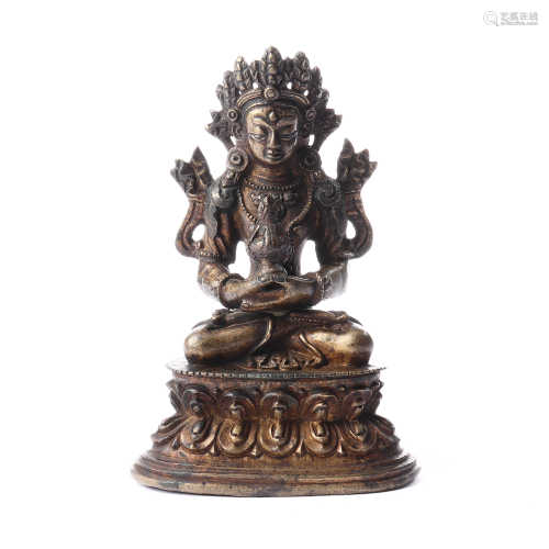 A bronze statue of Buddha