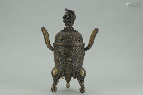 A Chinese Bronze Censer With Beast Carving