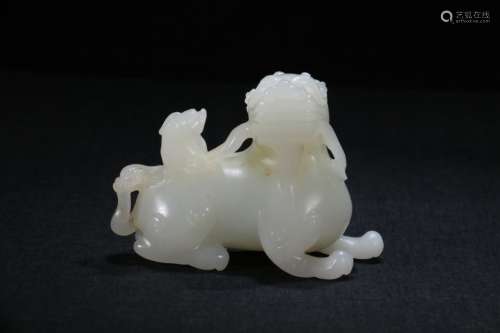 A Chinese Hetian Jade Pendant Of Beast Shaped