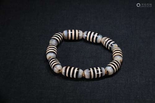 A Chinese Dzi Bracelet