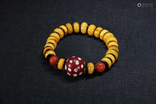 A Chinese Amber Bracelet With Bead