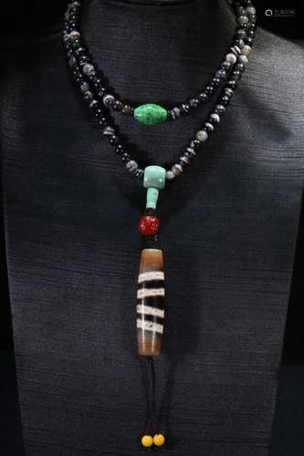 A Chinese Agate Necklace With Dzi