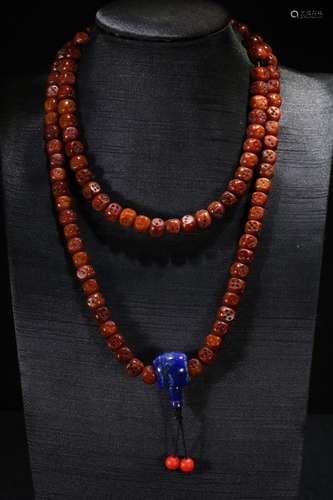 A Chinese Bone Necklace With Bead