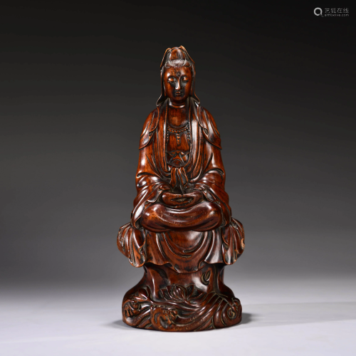 A Chinese Boxwood Carved Guanyin Statue