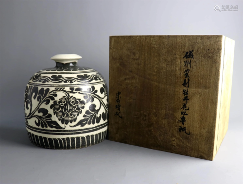A Chinese Cizhou Kiln Peony Carved Porcelain Vase