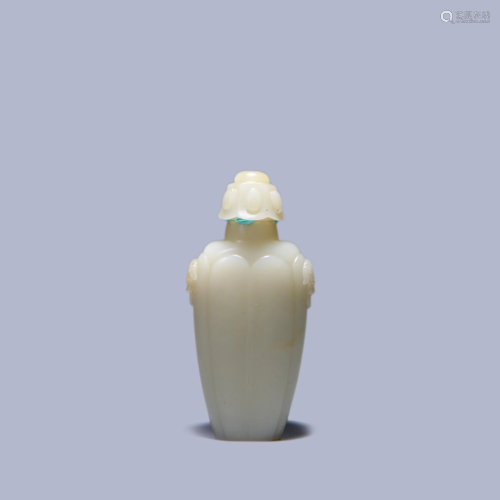 A Chinese White Jade Carved Beast Ears Vase with …