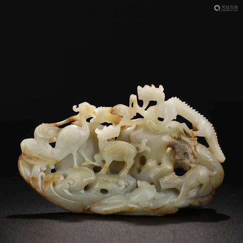 A Chinese White Hetian Jade Carved Beast Pattern