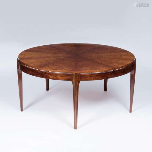 Eleganter Mid-Century Coffee-TableFrankreich, um 1960. Tropisches Edelholz, furniert. Runde