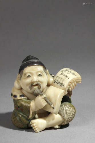 A Japanese netsuke from Meiji period circa 1900. Signed Yasuaki