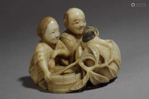 A Japanese netsuke circa 1860-1880 from Meiji period. Signed Masatami Con Kakihan