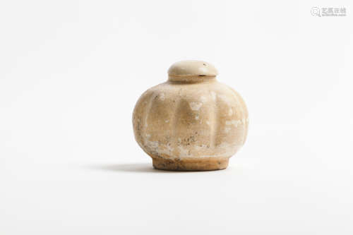 A small lobed jar with cover