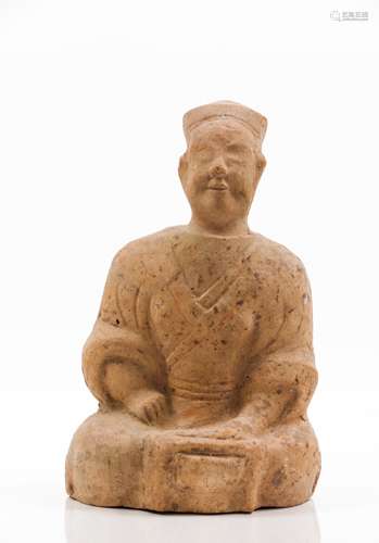 A Sichuan terracotta sculpture of a seated figure