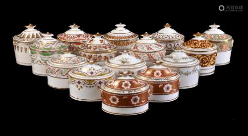 A collection of fifteen various English porcelain oval section sugar boxes and covers