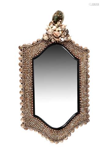 A shell clad wall mirror in the manner of 18th century giltwood examples