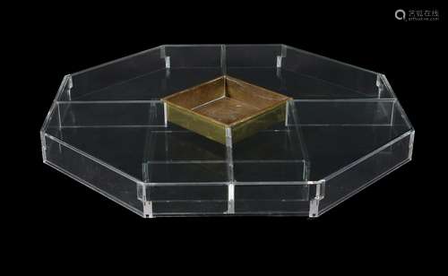 A Perspex and glass octagonal low centre table