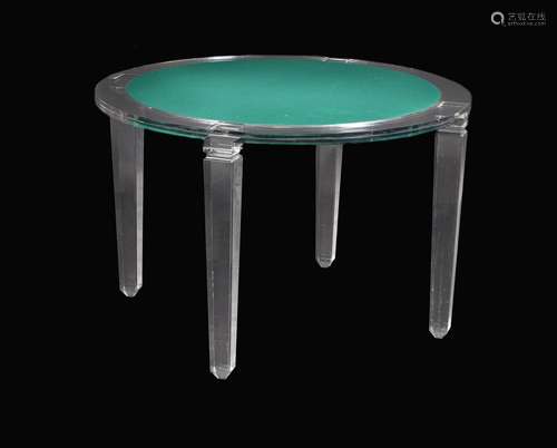 A circular Perspex card table