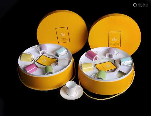 Two modern French porcelain boxed sets of six coffee cans and saucers for Christian Lacroix