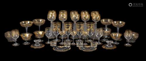 A Venetian clear-glass, engraved and gilt part table service