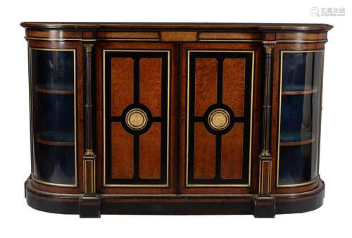 An Aesthetic Movement amboyna, burr walnut, ebonised, and parcel gilt credenza