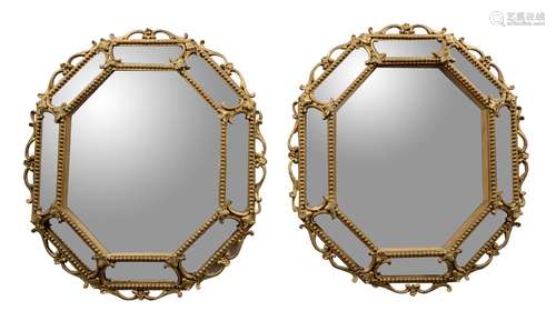 A pair of giltwood wall mirrors