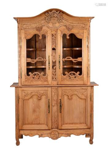 A French carved pine cabinet