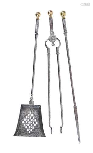 A set of steel and brass mounted fire tools