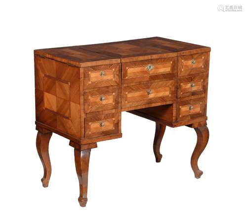 A French walnut quarter veneered and parquetry banded dressing table