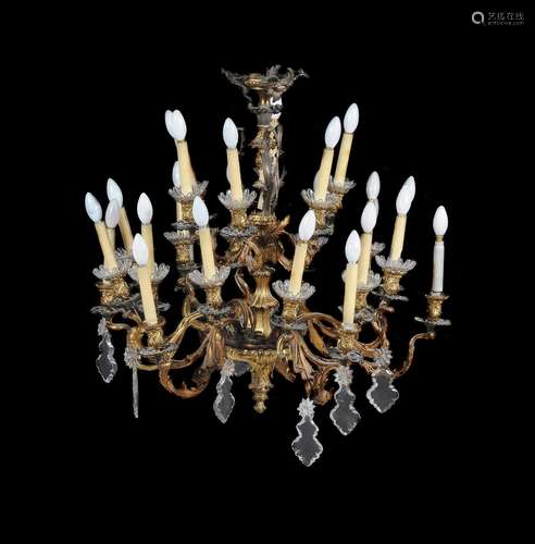 A Continental gilt-bronze and cut glass twenty-four light chandelier in Rococo taste