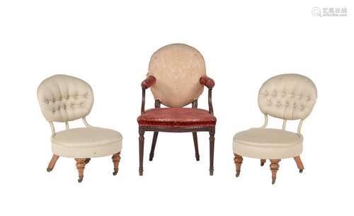 A pair of Victorian walnut and upholstered chairs