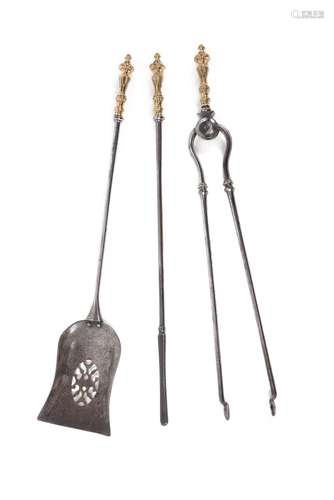 A set of William IV or early Victorian steel and brass mounted fire tools