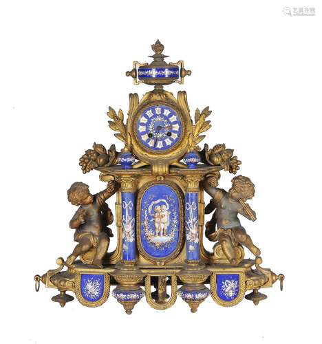 A French gilt metal and blue ceramic mounted mantel clock