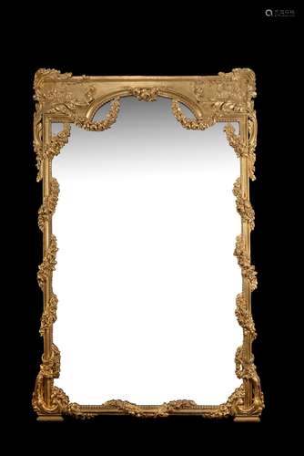 A giltwood and composition wall mirror