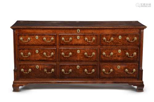 A George III oak and mahogany banded mule chest