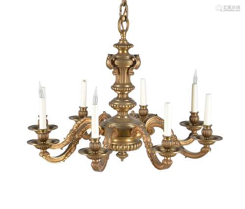 A French gilt bronze eight light chandelier in Regence taste