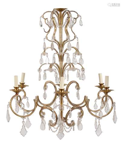 A Continental, gold painted wrought and sheet iron and glass mounted six light chandelier