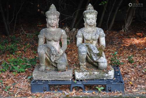 A pair of stone composition garden models of Guanyin