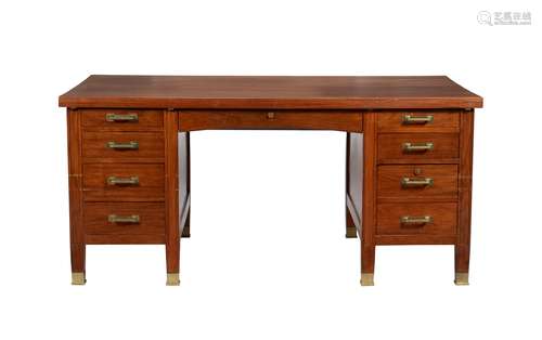 A figured hardwood pedestal desk