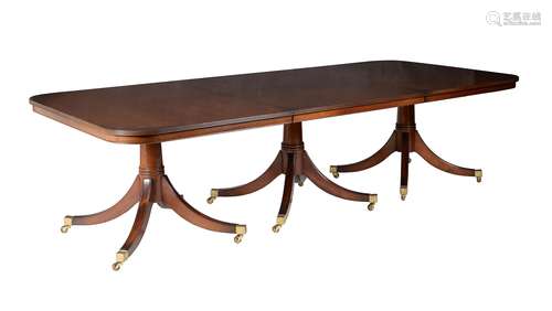 A mahogany triple pedestal dining table