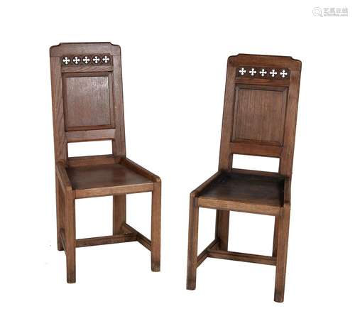 A pair of Gothic Revival oak hall chairs