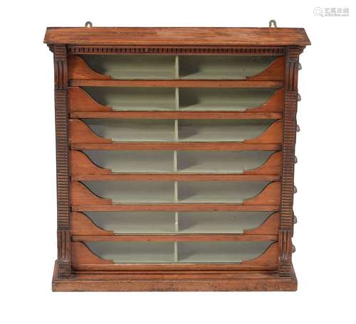 A seven drawer wall display cabinet