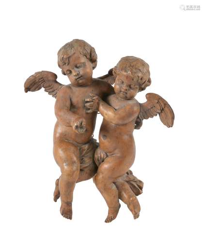 A German sculpted limewood figural group of cherubs