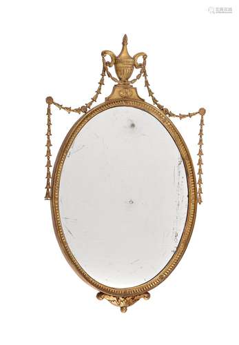 A giltwood and composition oval wall mirror