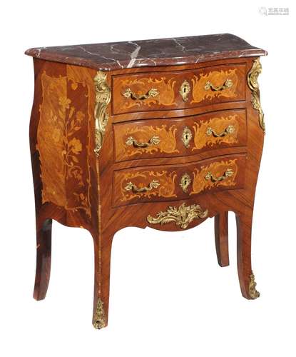 Y A kingwood and floral marquetry inlaid commode in Louis XV style