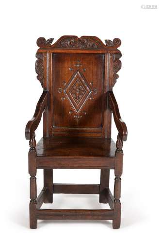 An oak wainscot chair in late 17th century style